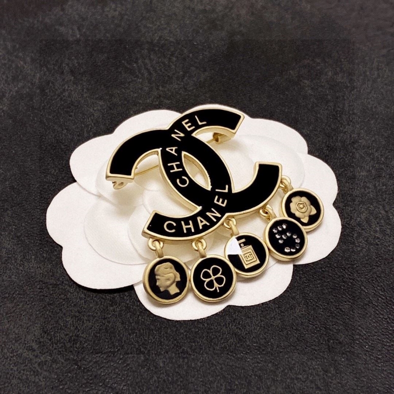 Ch*el brooches